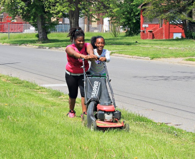 Pride Day S.M.B.C. Young Motivation Girls Club mowing