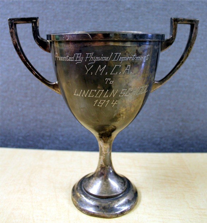 trophy cup presented by phys dept ymca to lincoln school 1914