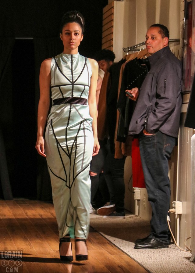 under Daddy's watchful eye